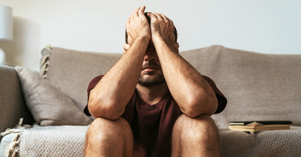Man struggling with anxiety & depression
